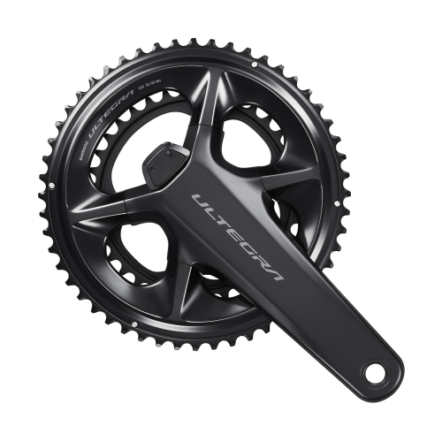 Ett detaljerat fotografi visar ett svart Shimano Ultegra FC-R8100-P wattmätarvevparti mot en vit bakgrund. Varm, riktad belysning framhäver vevpartiets släta yta och exakta detaljer.